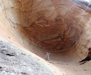 Yuri photographing a cave